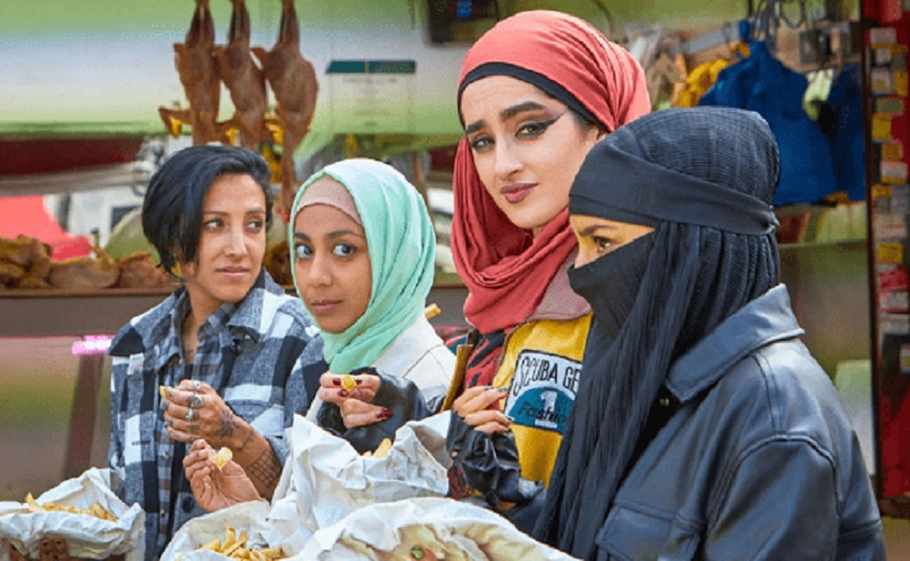 A still featuring Muslim characters eating food