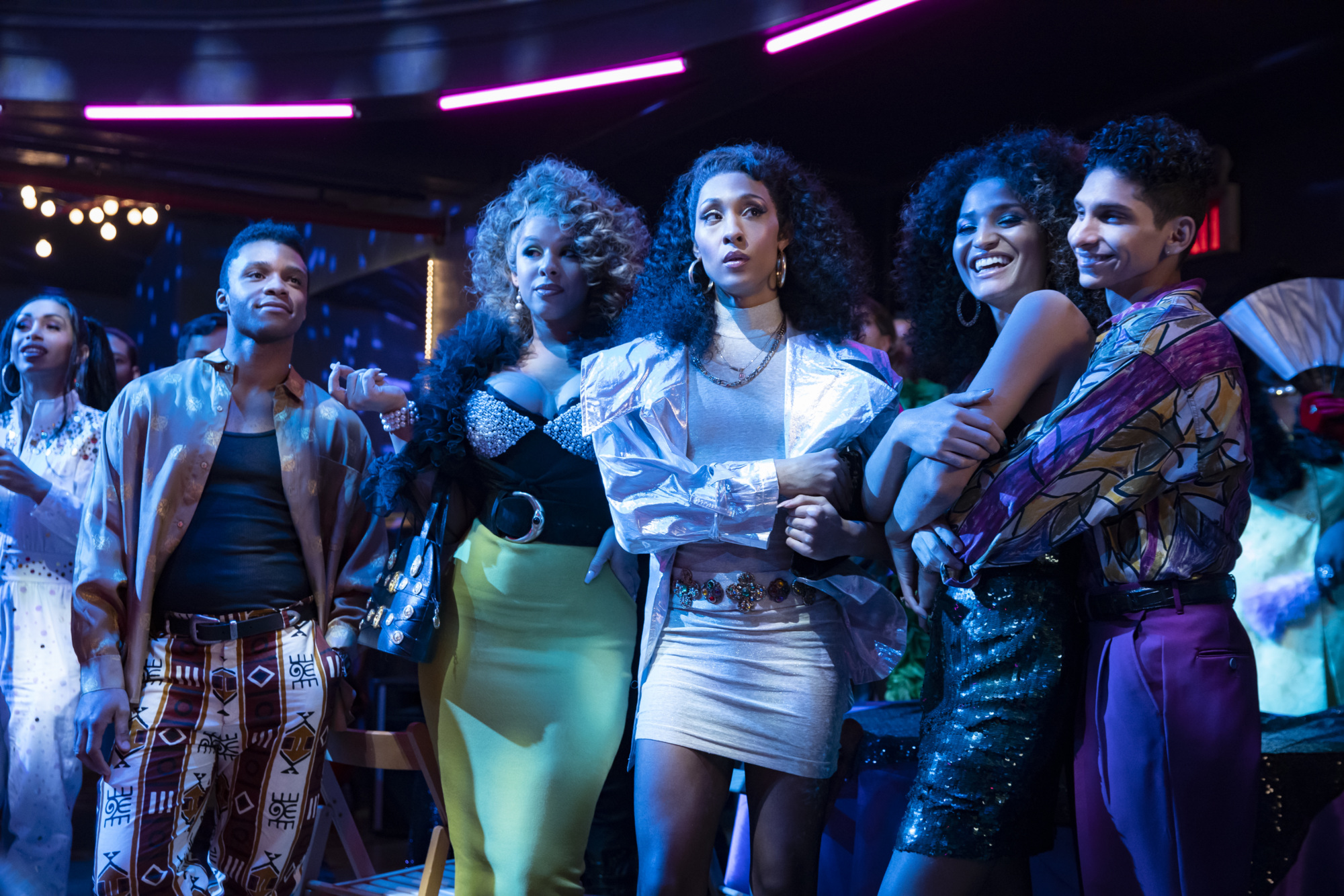 Still from 'Pose', cast stands in a night club