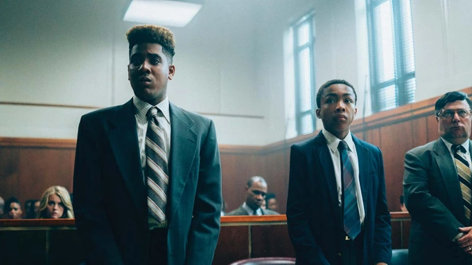 two figures in courtroom, still from "when they see us in court"